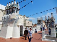 Casa Batllo  Gaudi designed house.  Roof is dragon back design.  Main structures are chimneys.