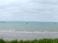 Remnants of WW2 Arromanches temporary artificial harbor  Temporary breakwaters installed on D-Day