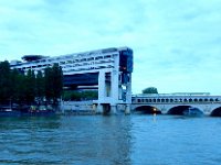 Ministry of Finance building and Bercy bridge  The Ministry of Finance building aka Bercy aka Fortress of Bercy.  Note speed boats available to transport the finance minister (plus a helicopter pad).