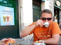 Craig enjoying coffee, churros, and chocolate at Valor